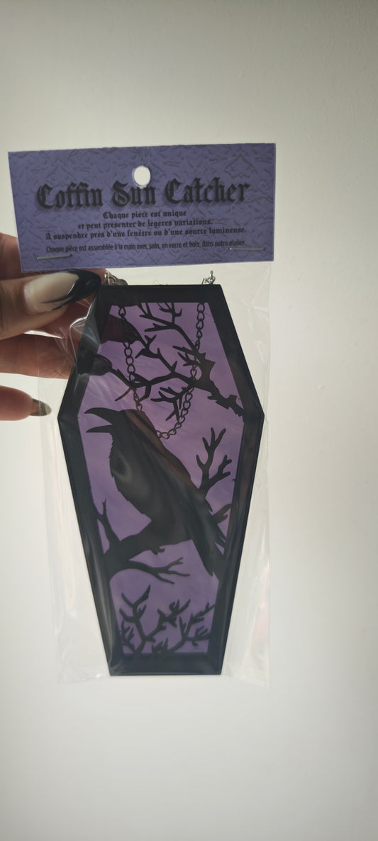 Cercueil verre corbeau violet