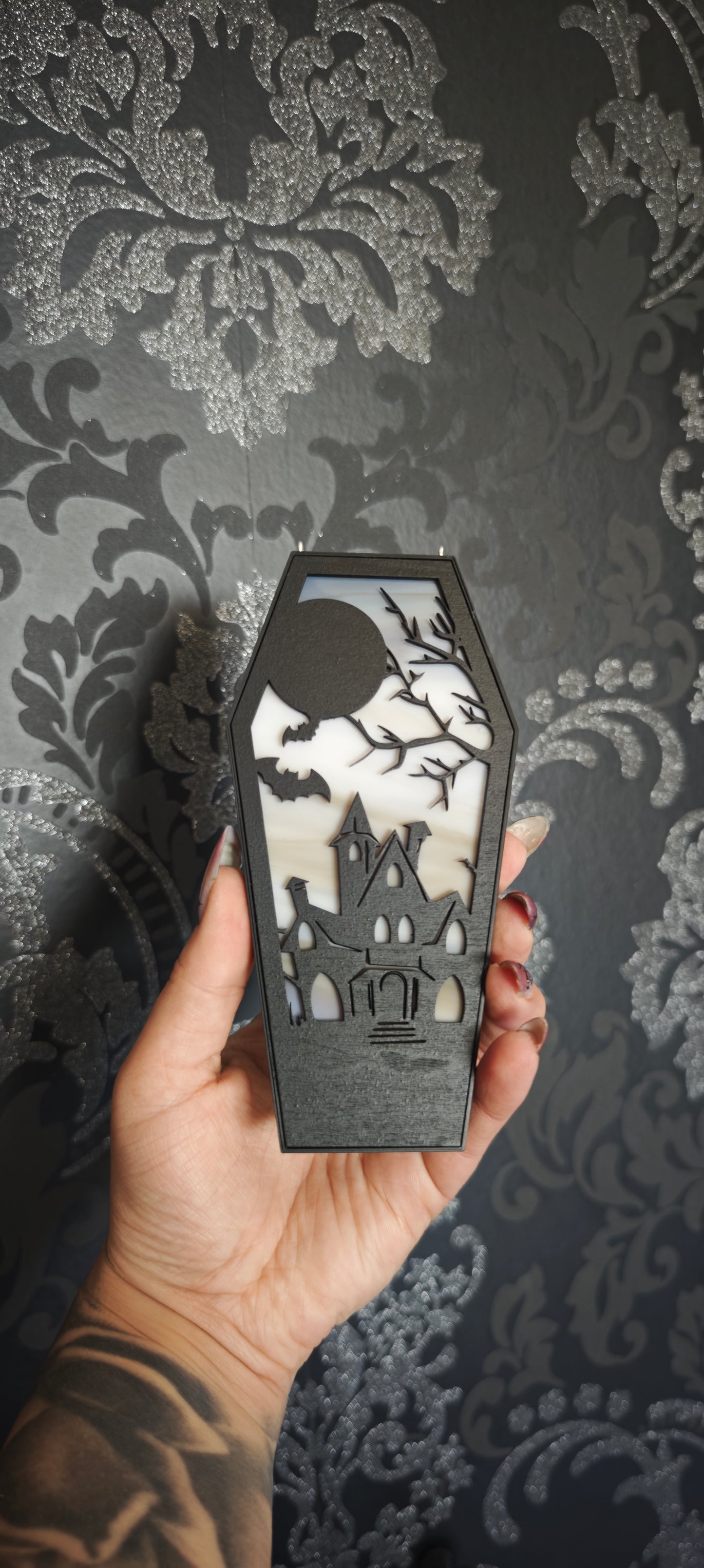 Cercueil verre château hanté marbré
