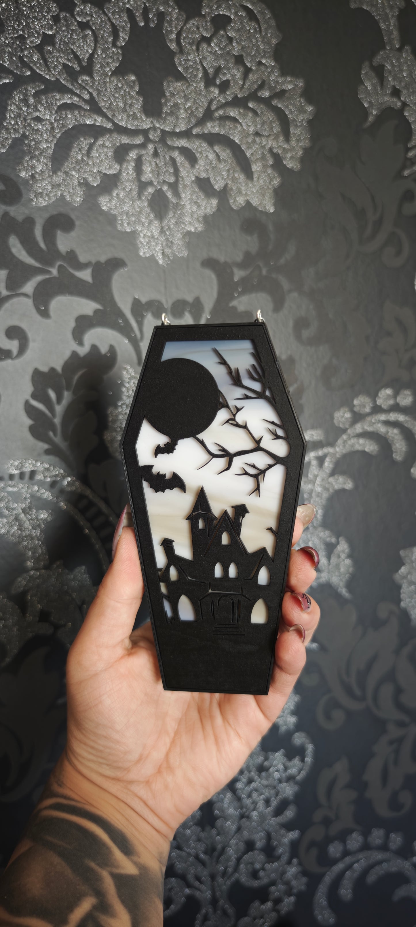 Cercueil verre château hanté marbré