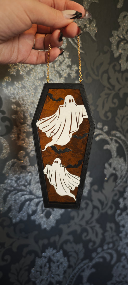 Cercueil verre ambré fantômes